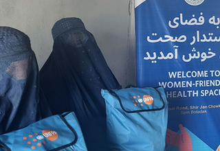 Women receiving dignity kits from WFHS in Spin Boldak.