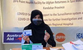 Midwife Zul Haja displays some of the reproductive health care supplies she provides for women at the Zero Point clinic in Afghanistan's Kandahar Province, on the border with Pakistan. © UNFPA/Stenly Sajow