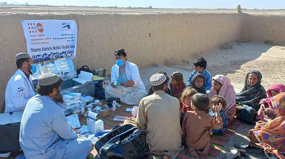 Health workers attending to patients in Nimroz