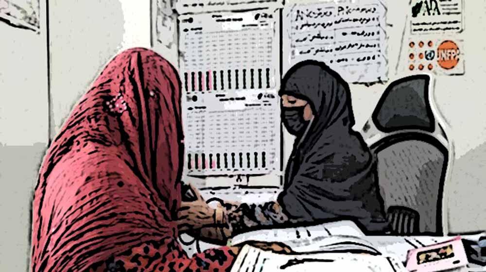 An illustration of a mother wearing red hijab being checked by a midwife wearing black hijab
