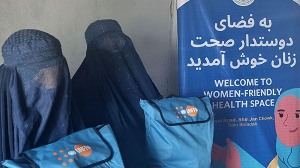 Women receiving dignity kits from WFHS in Spin Boldak.